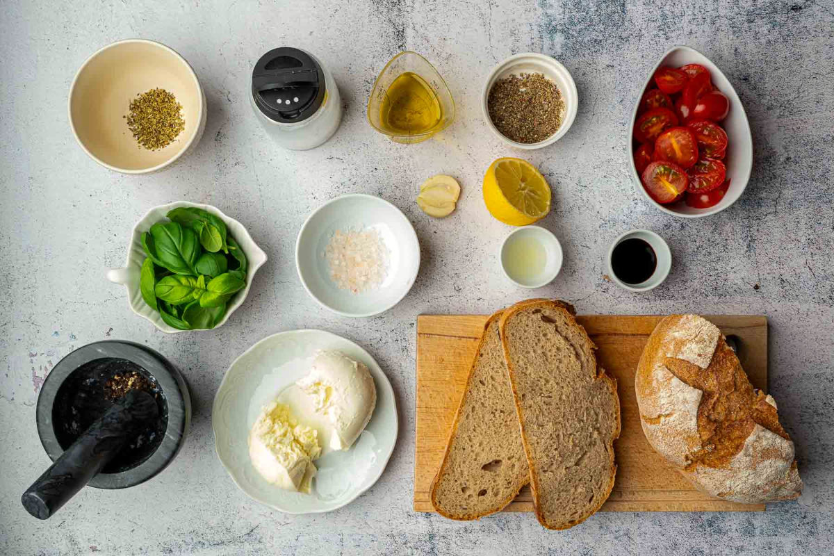 Ingredients placed on a grey surface.