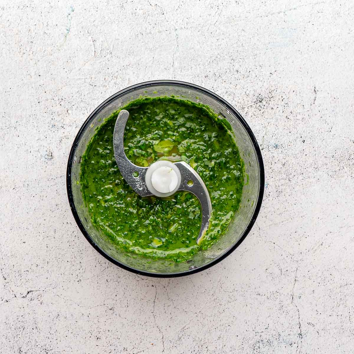 Basil drizzle in the food processor.