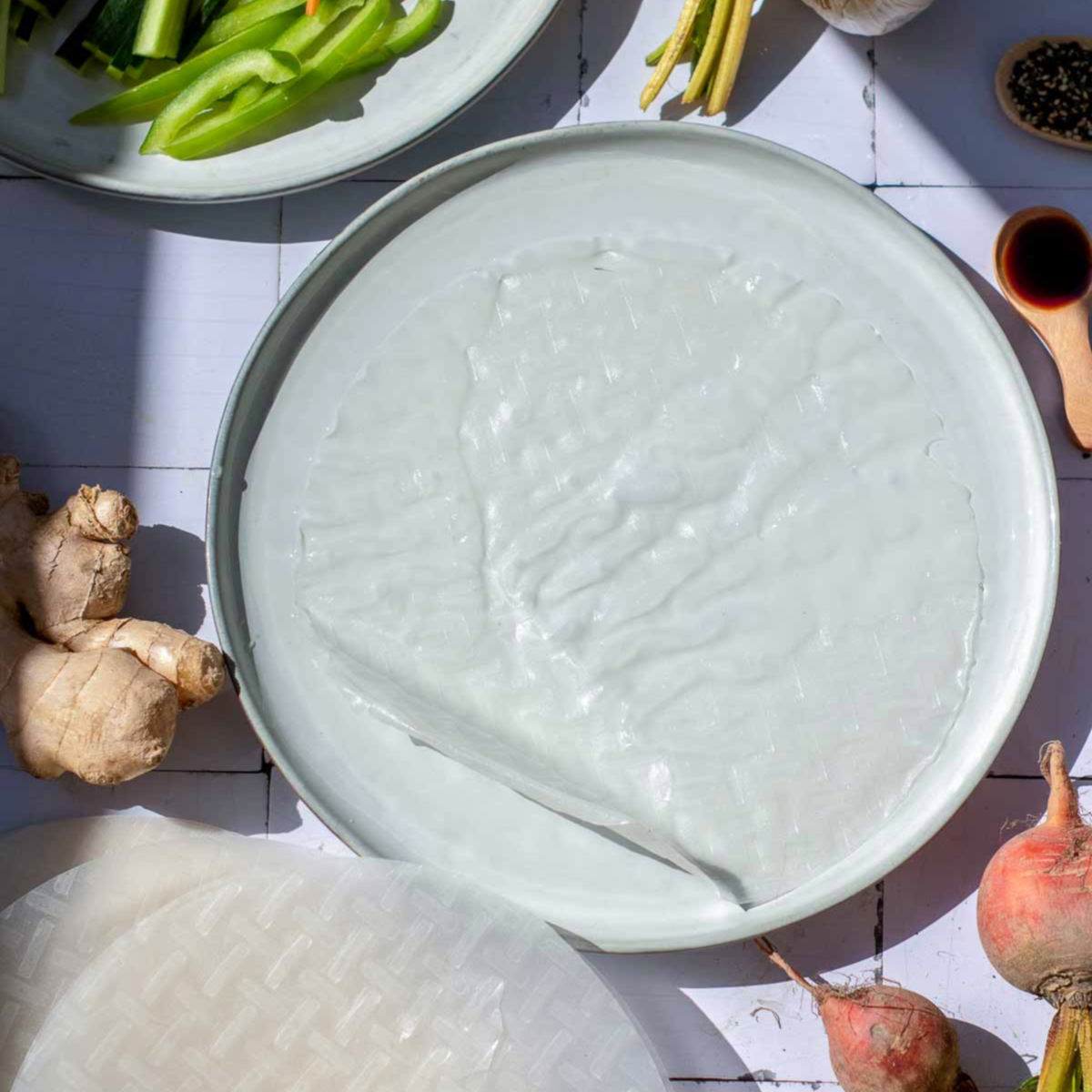 Rice paper rolls soaked in water.