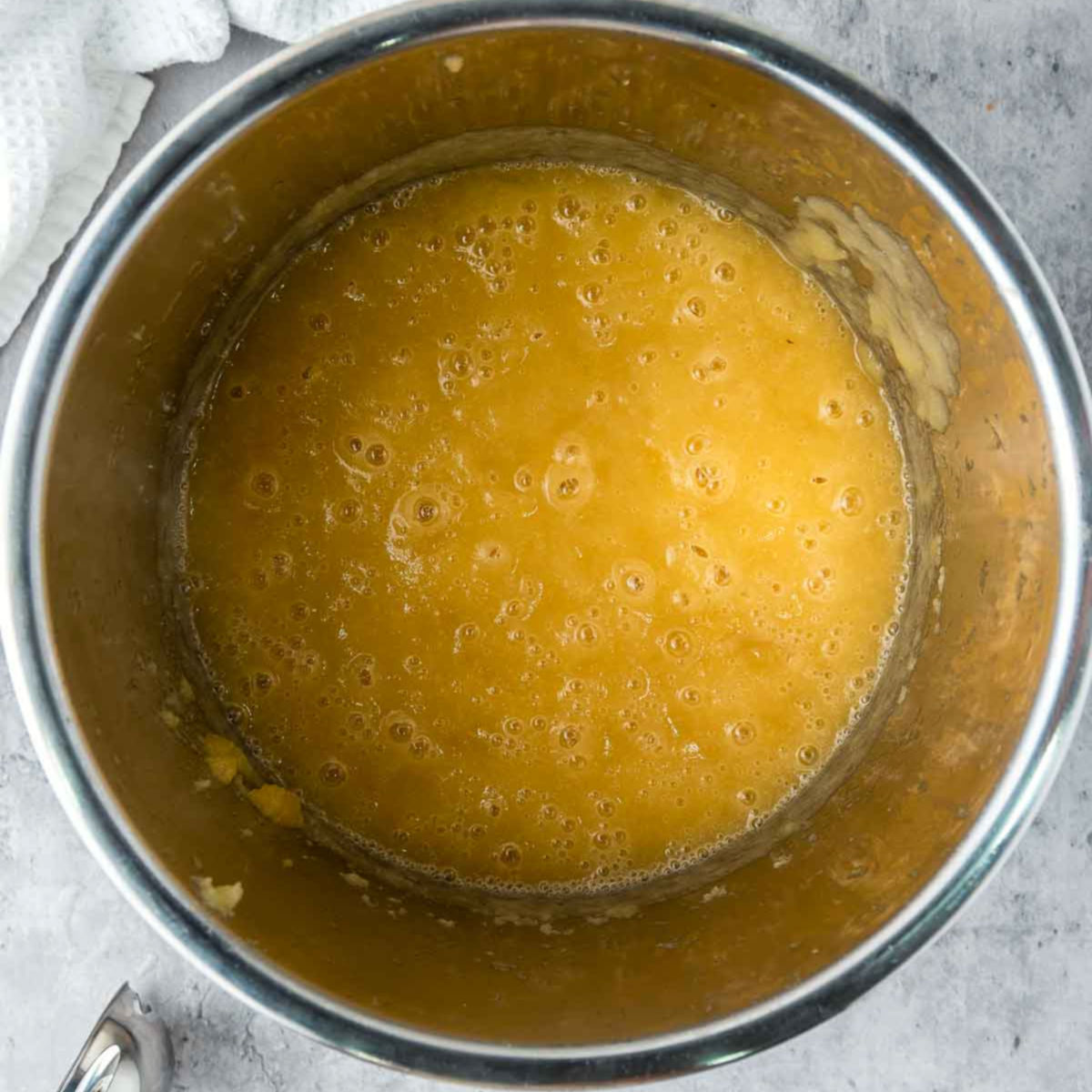 Blended smooth applesauce in the Instant Pot after cooking and mashing.