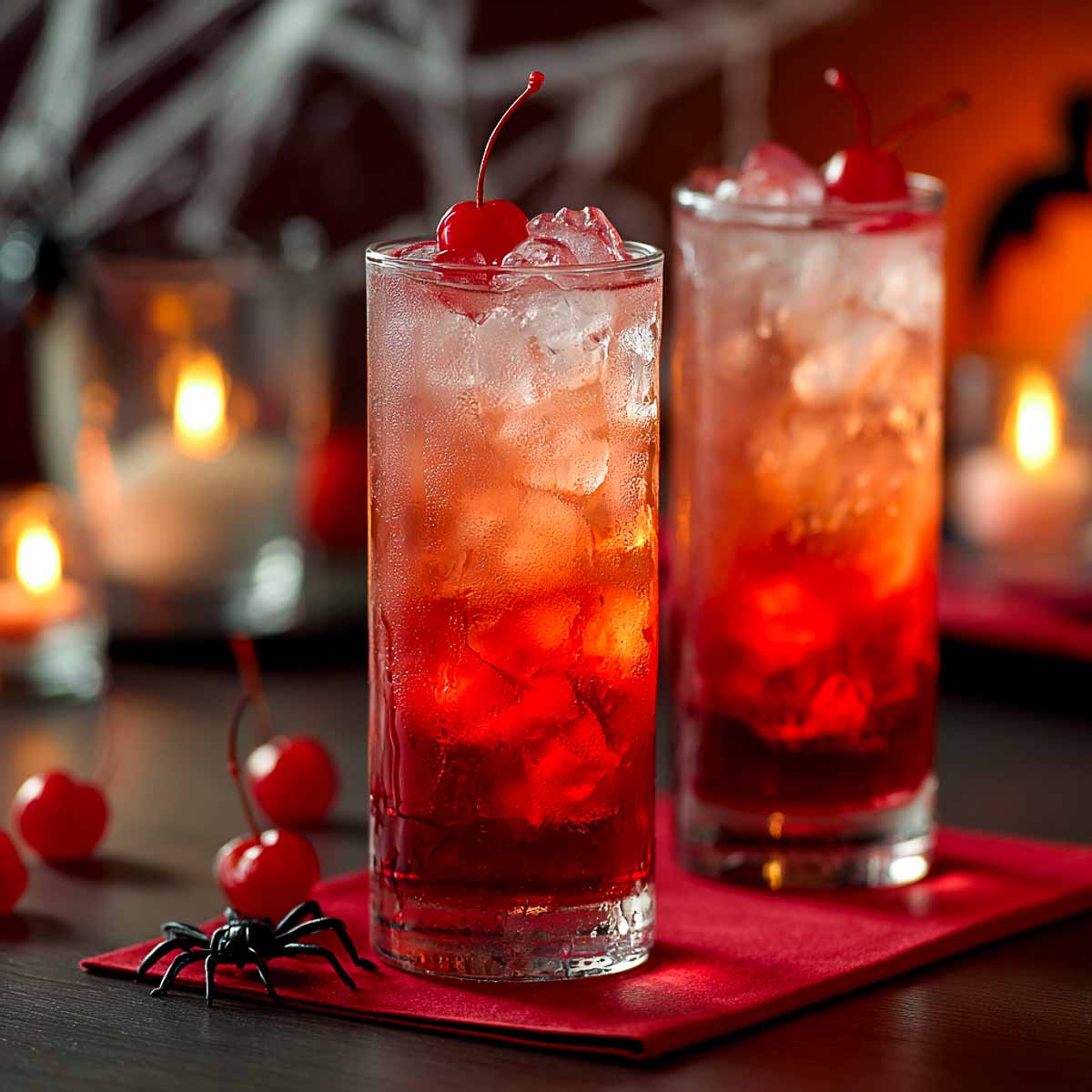 Halloween Shirley Temple with grenadine drip and maraschino cherry.