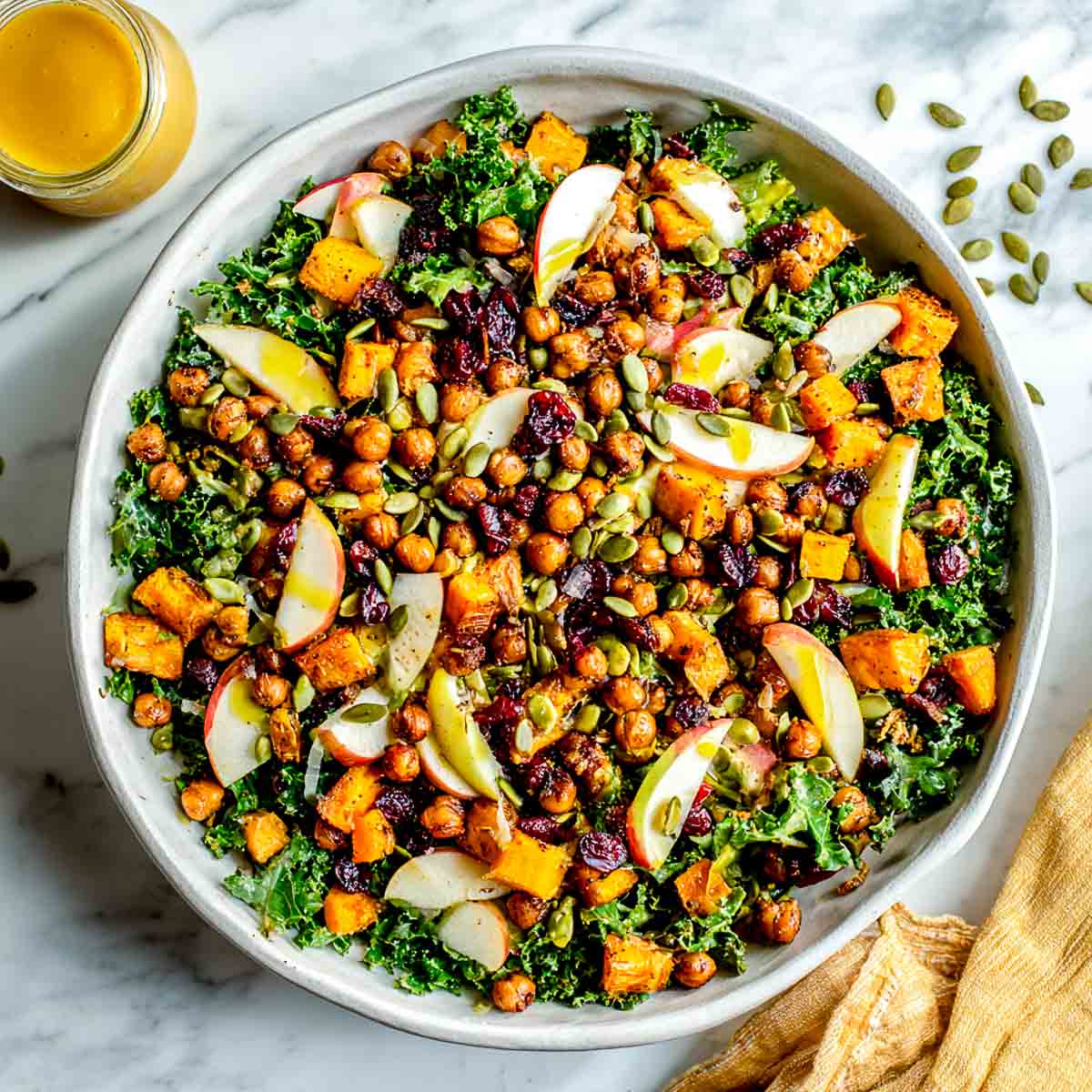 Crispy chickpea harvest salad with sweet potatoes, apples, and vinaigrette.