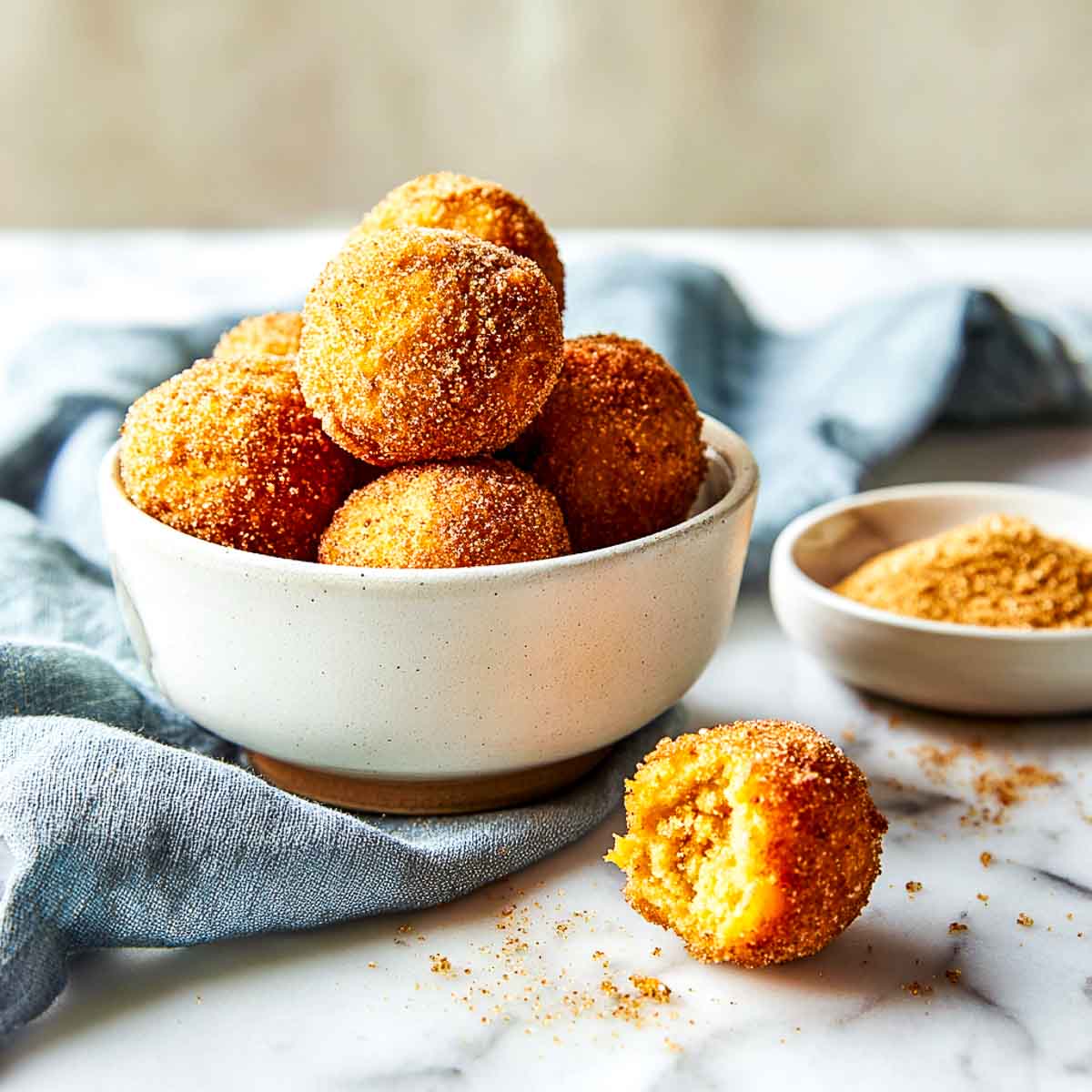 Freshly made pumpkin recipe cooked in the air fryer on marble surface.