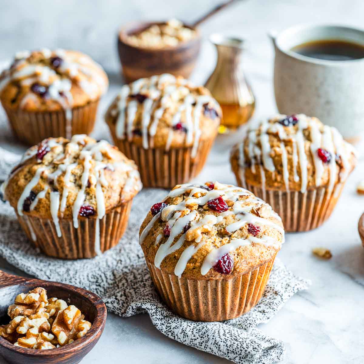 Cranberry walnut muffins with maple drizzle.