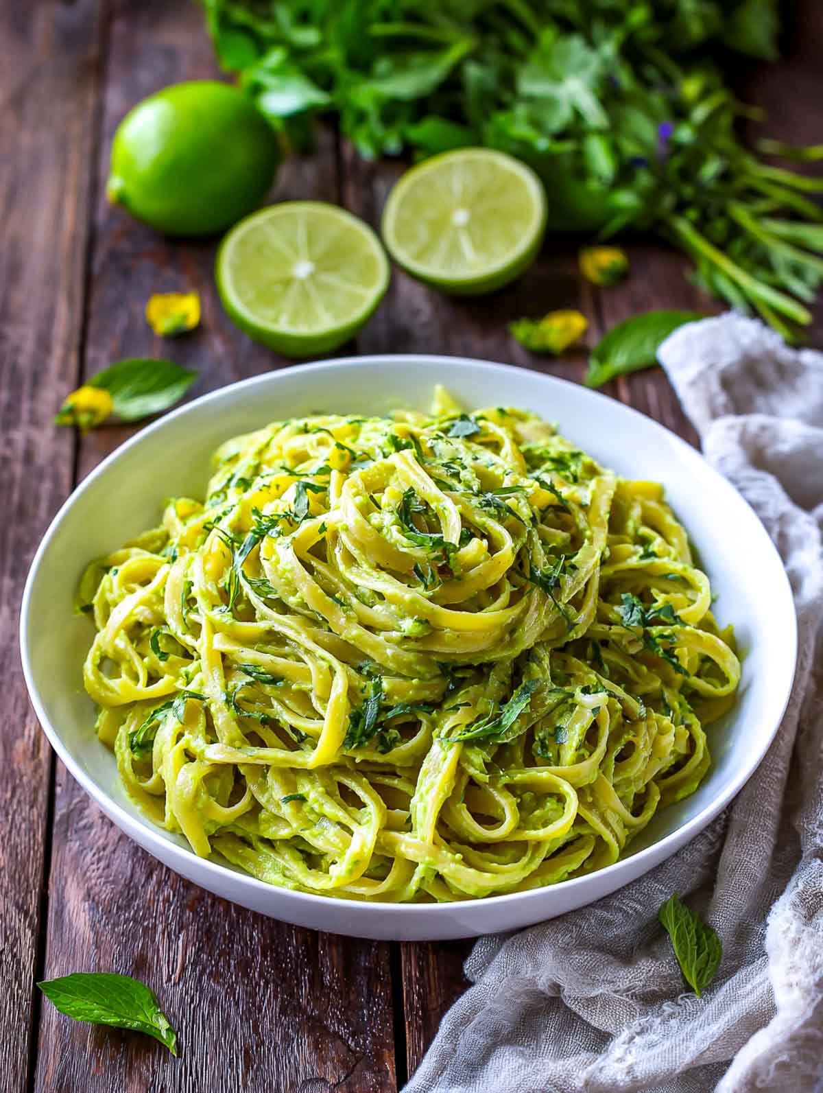 Pasta tossed in a creamy avocado lime sauce with fresh herbs.