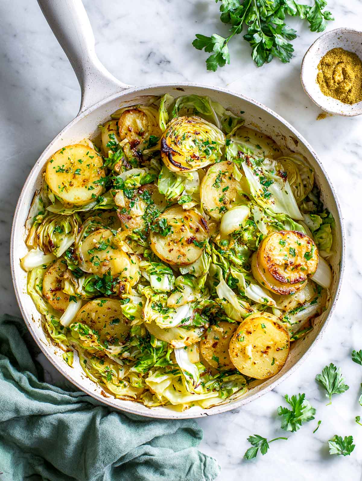 Sautéed cabbage and potatoes cooked together in a Dijon butter sauce.