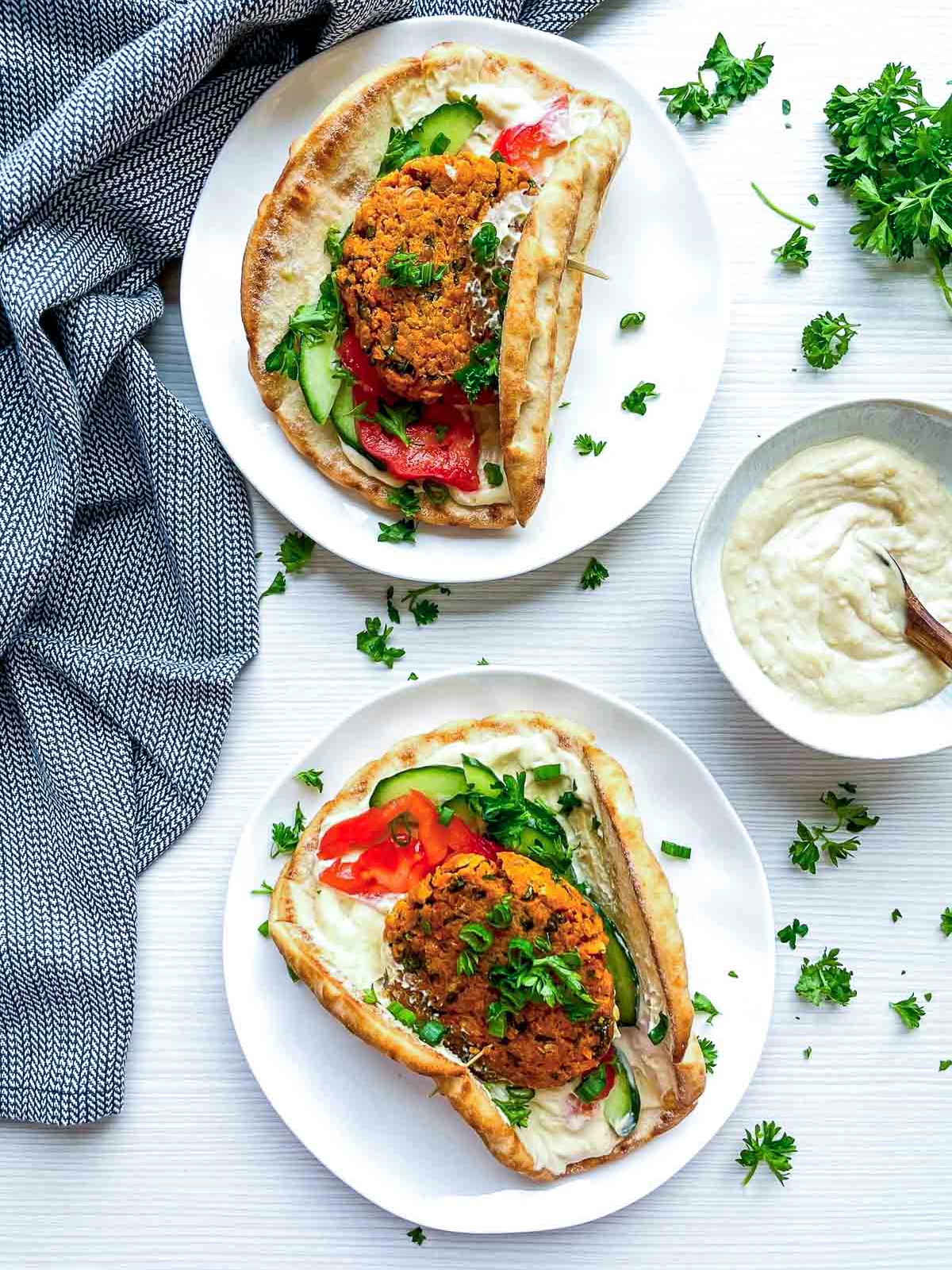 Falafel pita with cucumber, tomato, and creamy sauce